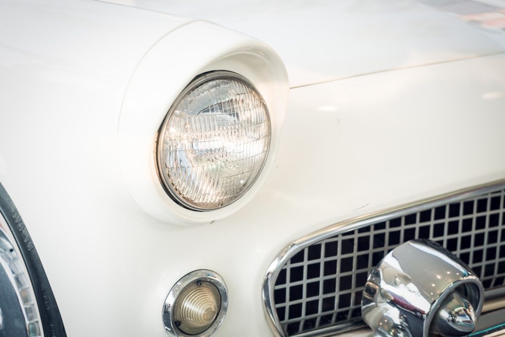 Selective focus point on Headlight lamp car - vintage filter